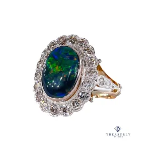 An exquisite 2.25ct Authentic Antique Art Deco Black Opal and Diamond Cluster Cocktail 18K Gold Ring
