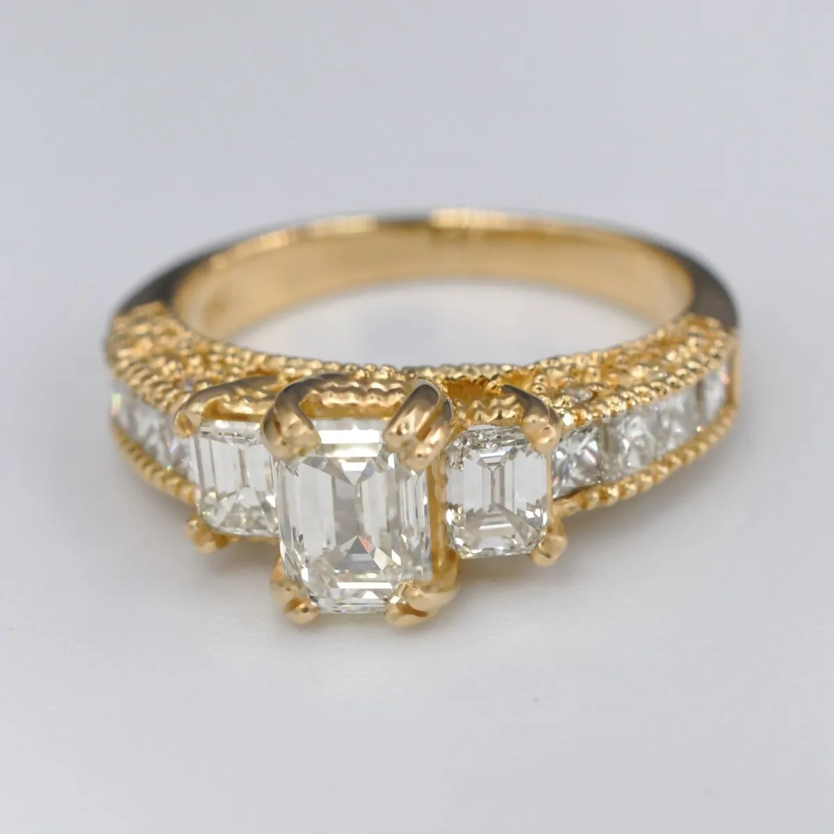 Prestige 2.60 CT Emerald, Princess, and Round Cut Diamond Engagement Ring in 18KT Yellow Gold