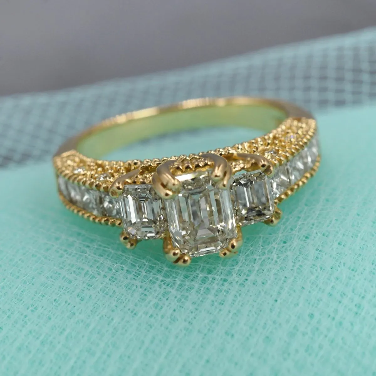 Prestige 2.60 CT Emerald, Princess, and Round Cut Diamond Engagement Ring in 18KT Yellow Gold