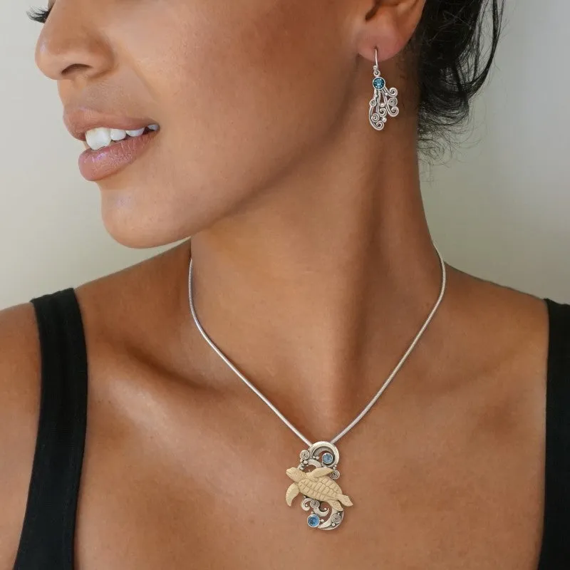 "Turtle Spirit" Fossilized Mammoth Tusk, Blue Topaz, and Sterling Silver Pendant