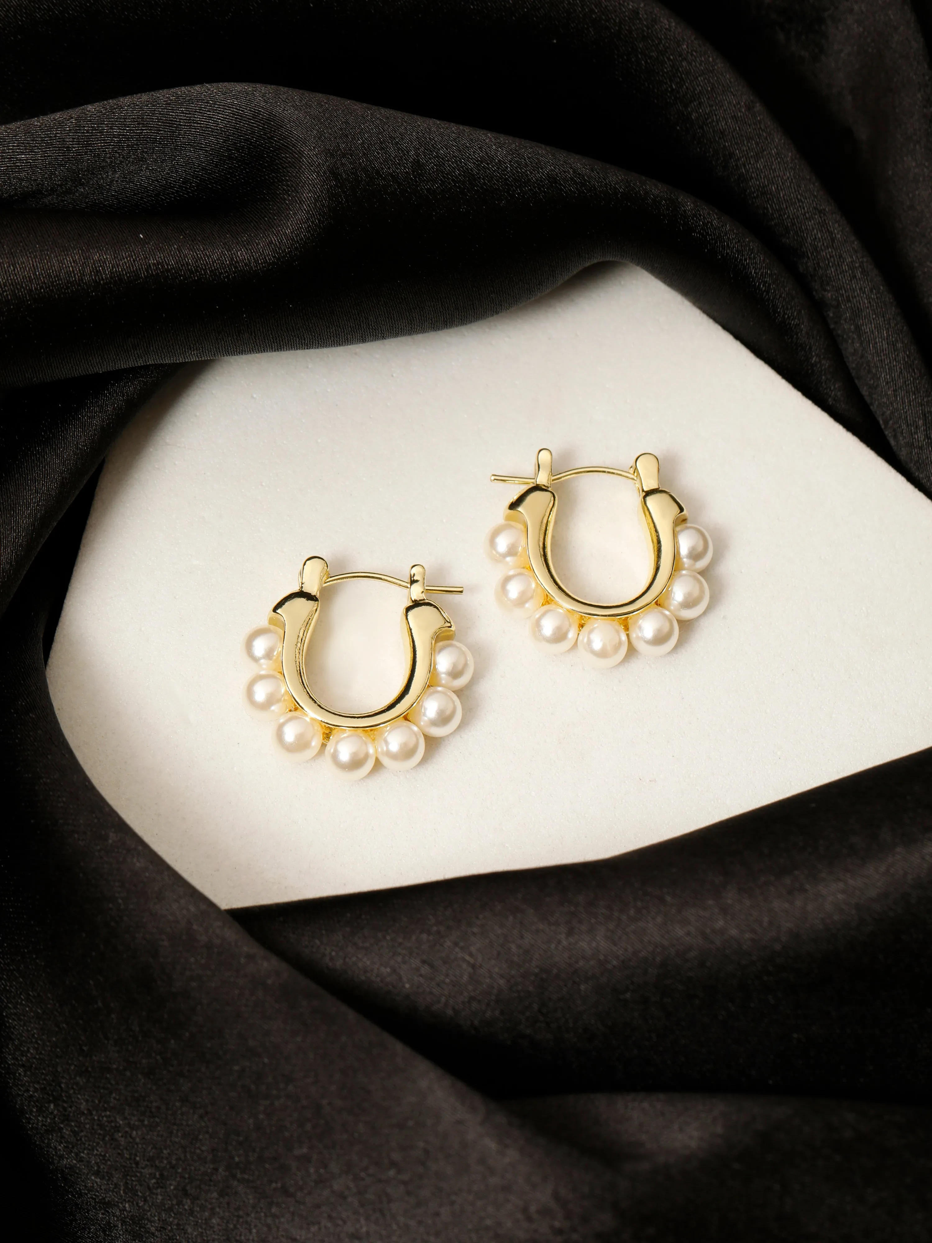 Radiant pearl hoops